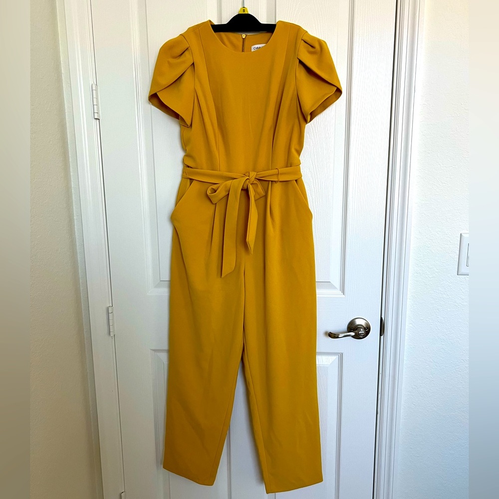 Mustard yellow Calvin Klein jumper.